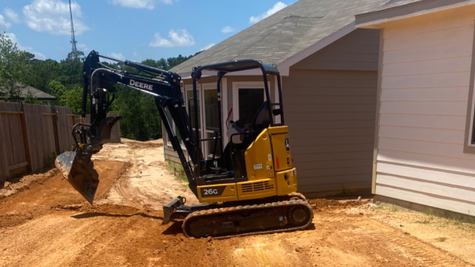 Rent this 2022 Mini Excavator Deere 26G located in Magnolia, TX